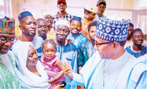 23 freed train passengers reunite with families after meeting Buhari