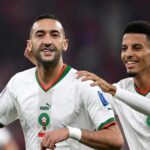Hakim Ziyech and Azzedine Ounahi celebrate Morocco win against Canada
