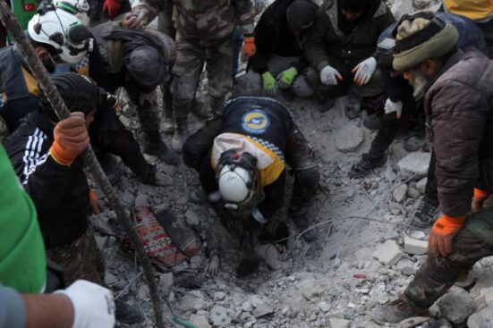 Some survivors of the Turkey, Syria quake trying to pull a victim out of the rubbles