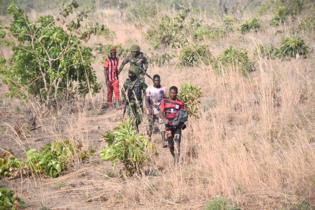 Some of the victims being led out of the forest along the Kaduna-Birin Gwari road after their rescue