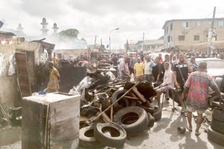 Hoodlums set Ajegunle spare parts market on fire