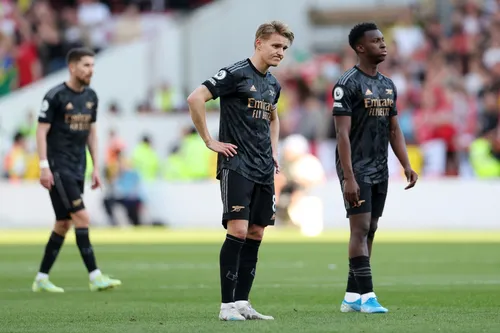 Arsenal players looking dejected after 1-0 loss to Nottingham Forest