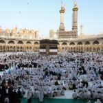 Muslim pilgrims gather around the Kaaba, Islam's holiest shrine, as they perform Eid Al-Adha morning prayers in Mecca, on June 28, 2023. (Photo by Abdulghani BASHEER / AFP)