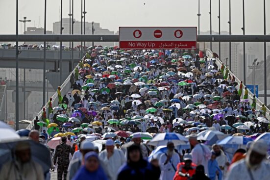 Muslim pilgrims arrive to perform the symbolic stoning of the devil ritual as part of the hajj pilgrimage in Mina, near Saudi Arabia's holy city of Mecca, on June 29, 2023. (Photo by Sajjad HUSSAIN / AFP)