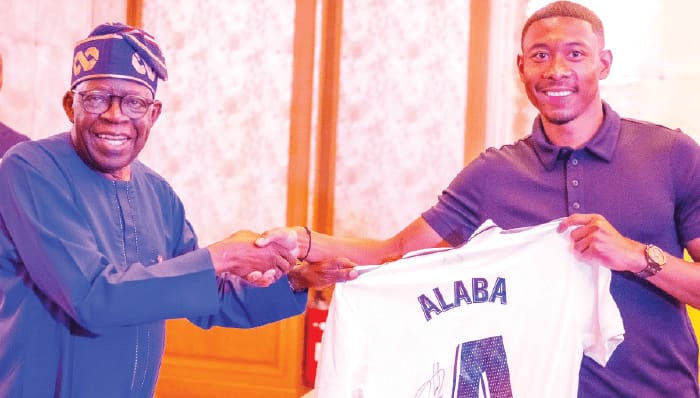 PHOTO: Madrid Star, David Alaba, Gifts Tinubu Jersey