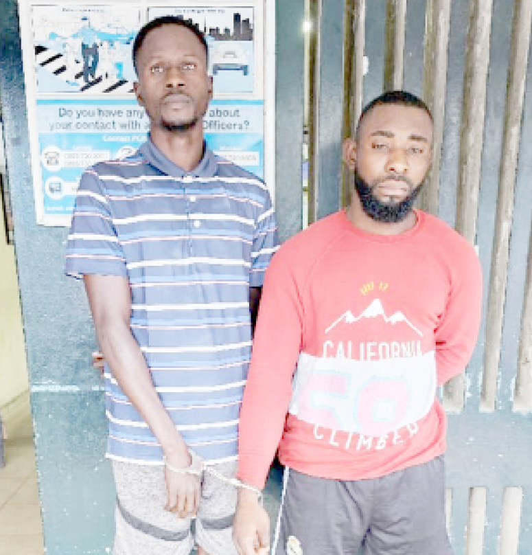 Guard, 1 other arrested for robbery