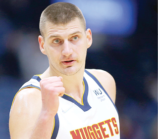 Jokic inspires Nuggets to opening win over Lakers