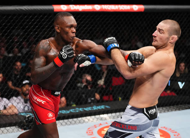 Strickland stuns Adesanya to snatch UFC middleweight title