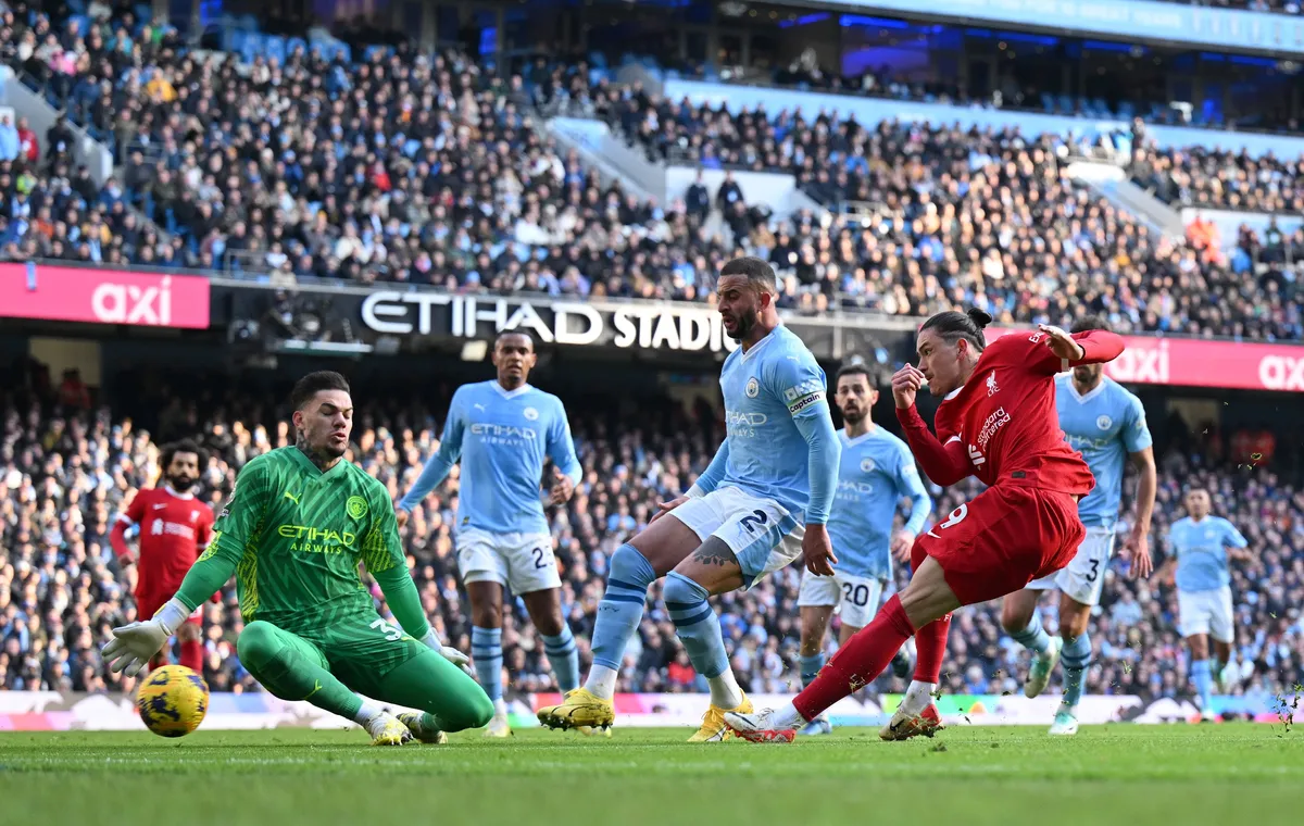 Liverpool hold Man City in top table battle