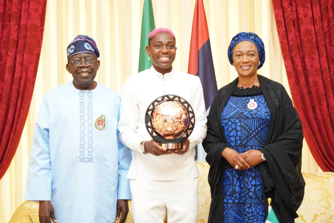 Asisat Oshoala presents CAF award to Tinubu, First Lady