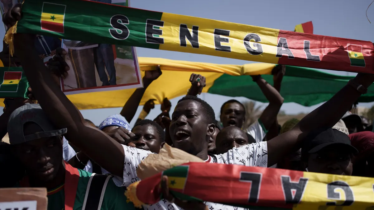 Hundreds protest in Senegal demanding new election date