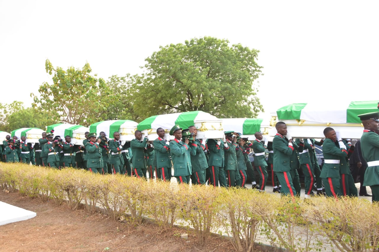 Tinubu arrives burial of slain soldiers