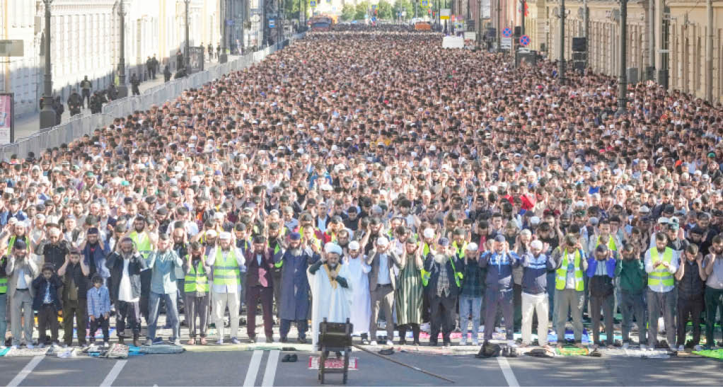 muslims offer eid prayers at the moskovsky central avenue during celebrations in st petersburg, russia. [dmitri lovetsky ap photo]