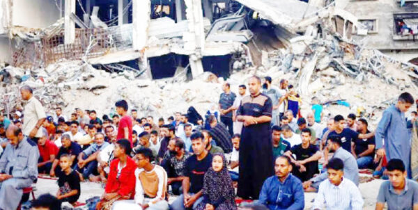 palestinians hold eid al adha prayers by the ruins of ar rahma mosque destroyed by israeli air strikes, in khan younis, in the southern gaza strip. [mohammed salem reuters]