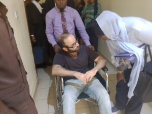 PHOTOS: Embattled Binance executive arrives Abuja Court in Wheelchair amid trial