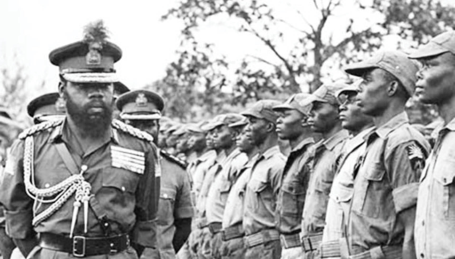 ojukwu, as military governor of biafra, inspecting some of his troops in 1968.