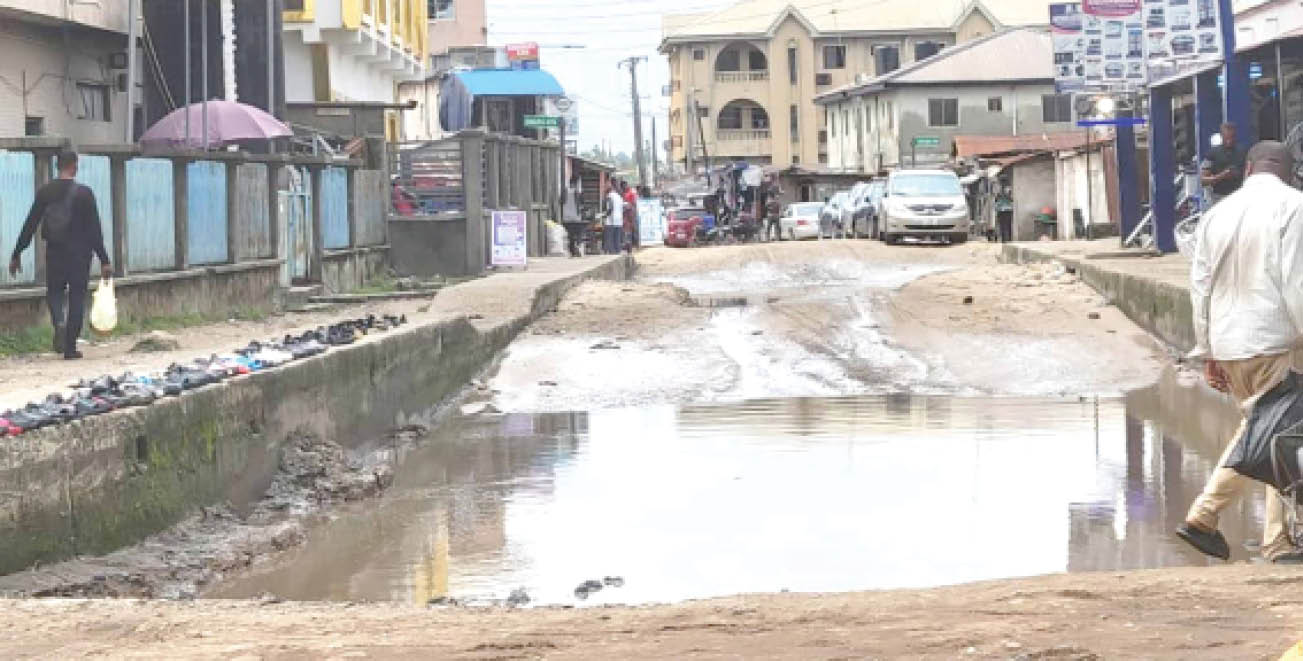 bad portion of the road leading to alaba international market