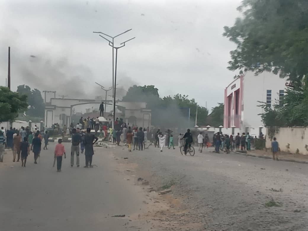 Protesters lit bonfire in front of Kano Govt House