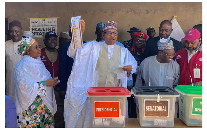 Nigerian former president Muhammadu Buhari showing his ballot paper to journalists on the day of the presidential election  in Daura, Katsina state. Photograph by Samad Uthman/CCIJ