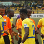 gombe united players exchanging pleasantries with referees before a match in the npfl