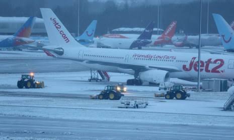 ENGLAND: Snow disrupts air travelling