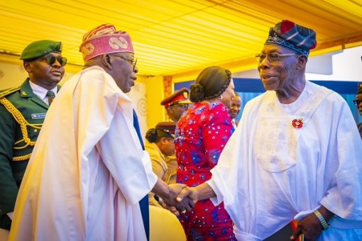 PHOTO: Tinubu, Obasanjo shake hands in Ghana